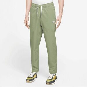 Nike Men's Club Woven Taper Leg Pants in olive green / white